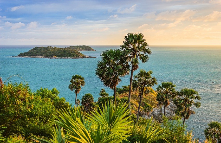 Sunset at Promthep Cape Phuket with views of the sea and offshore islands