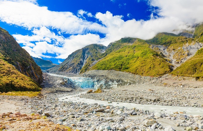 Fox Glacier on New Zealand’s West Coast with ice flows descending from the Southern Alps