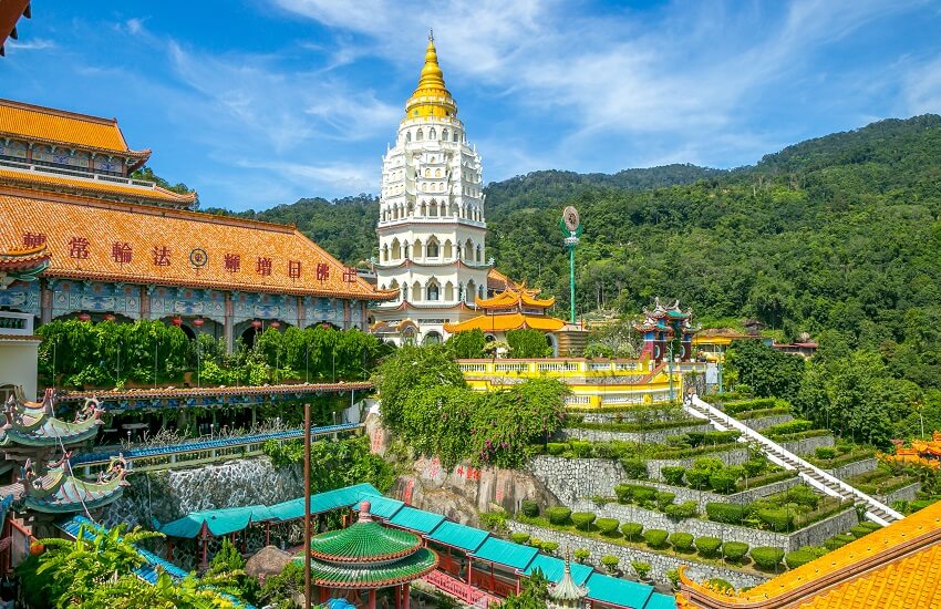 Kek Lok Si Temple surrounded by manicured gardens and colourful temple buildings.