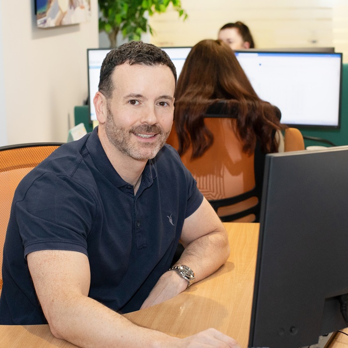 Gavin Working at eShores Office